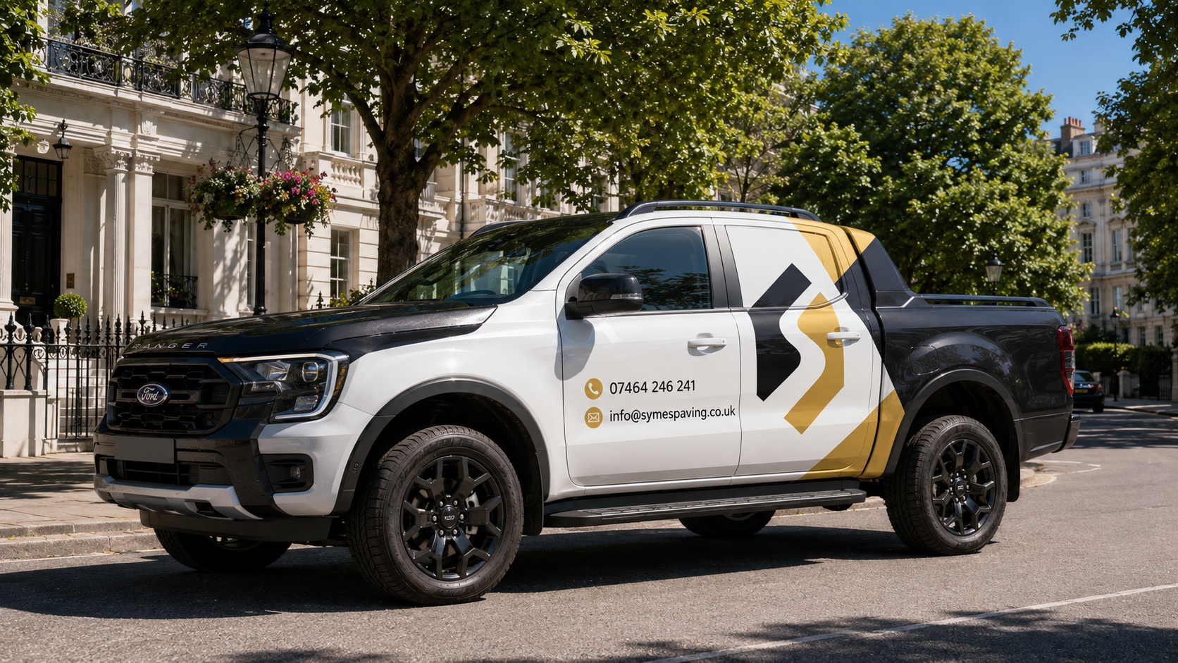 Symes Paving branded Ford Ranger parked on a London residential street