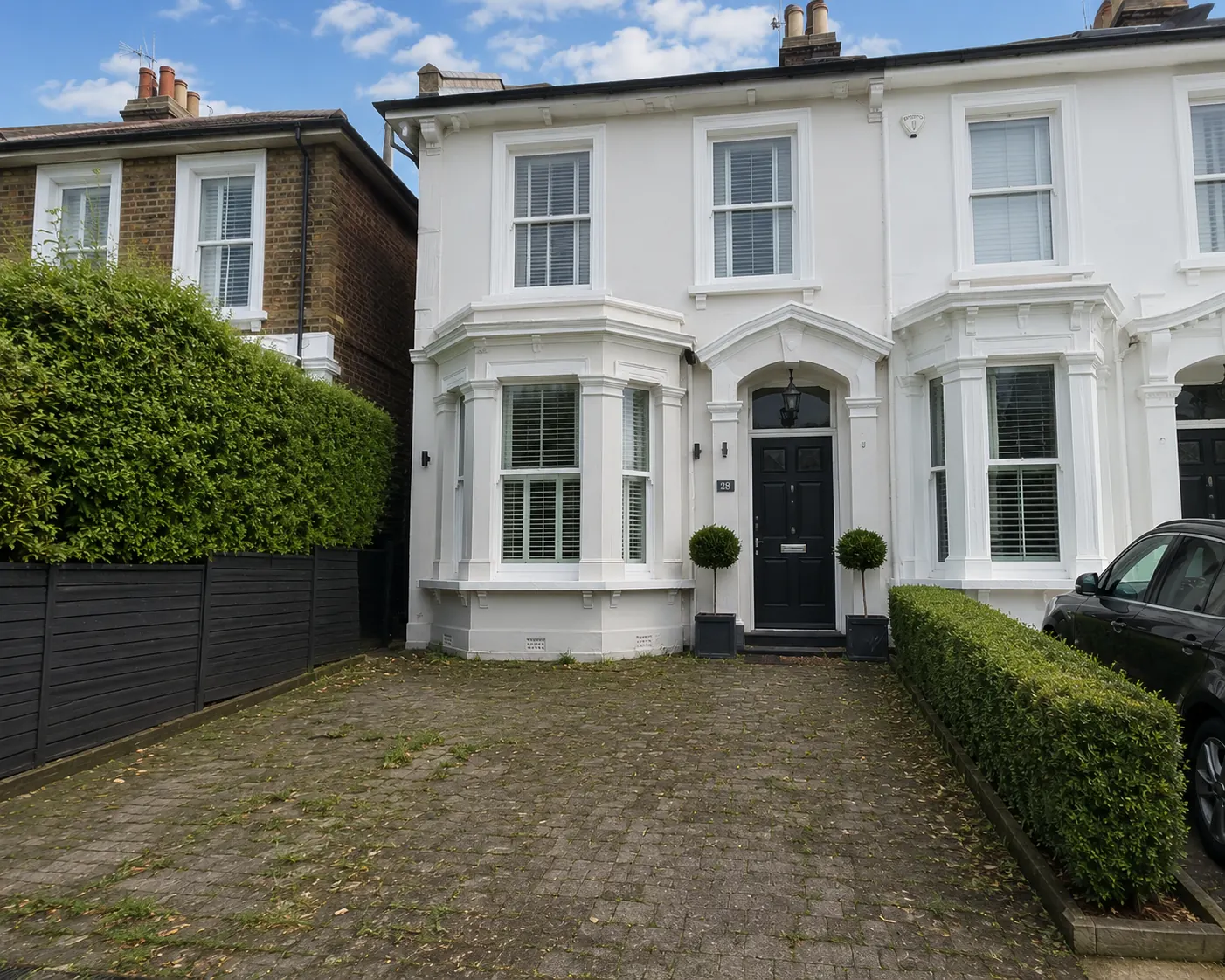 Before — Silver-grey block driveway with diamond feature