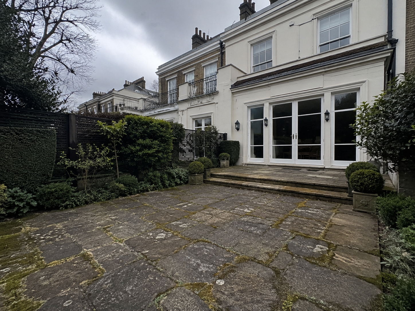 Before — Porcelain-tiled rear garden patio